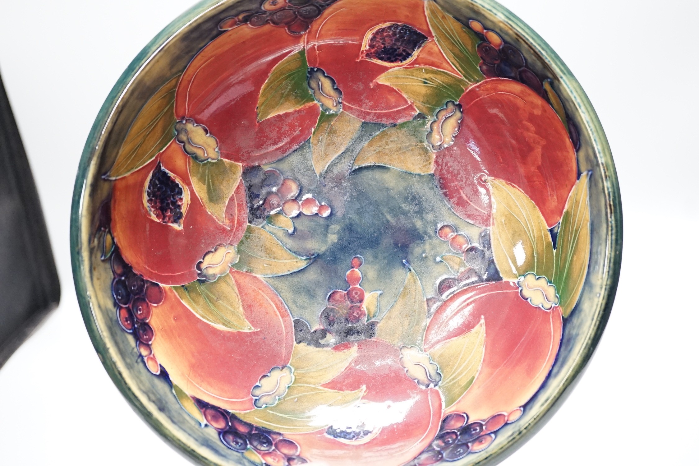 A Moorcroft Pomegranate pedestal bowl, 1920s, 23.5cm diameter